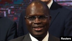 FILE - Dakar Mayor Khalifa Sall during a summit on climat with local representatives (not seen) at Paris town hall, as part of the World Climate Change Conference 2015 (COP21), France, Dec. 4, 2015. 