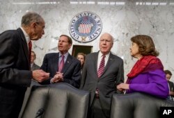 From left, Senate Judiciary Committee Chairman Sen. Charles Grassley, R-Iowa, Sen. Richard Blumenthal, D-Conn., Sen. Patrick Leahy, D-Vt., and the committee's ranking member Sen. Dianne Feinstein, D-Calif., meet on Capitol Hill in Washington, March 22, 2017, prior to the start of the committee's confirmation hearing for Supreme Court Justice nominee Neil Gorsuch.
