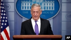 FILE - Defense Secretary Jim Mattis speaks during the daily news briefing at the White House, in Washington, Feb. 7, 2018. 