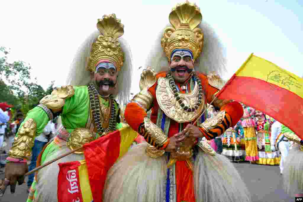 &quot;Veeragase&quot; folk artists of Karnataka dressed as deities take part in a rally during &quot;Mahaveer Jayanthi&quot; festival celebrations in Bangalore, India.