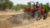 A farmer plows the field in Saulawa village, on the outskirts of Nigeria's north-central state of Kaduna, May 2013 file photo. 