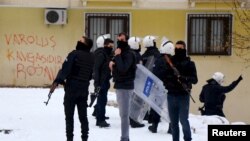 Turkish riot police secure the area outside the pro-Kurdish Democratic Regions Party (DBP) headquarters in the southeastern city of Diyarbakir, Turkey, Jan. 5, 2016. Security forces killed 32 Kurdish militants in Turkey's mainly Kurdish southeast this weekend, the army and security sources said on Jan. 10, 2016.