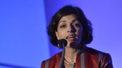 FILE - Rina Amiri speaks at a conference to protect Afghan women's rights, in New York City, May 30, 2013.