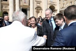 Fox News Channel host Bill O'Reilly shakes hand with Pope Francis during the Wednesday general audience in Saint Peter's square at the Vatican, April 19, 2017.