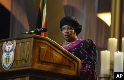 FILE - Malawi President Joyce Banda speaks during funeral service for Nelson Mandela, Qunu, South Africa, Dec. 15, 2013.