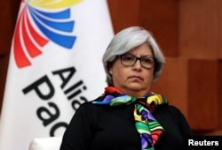 FILE - Mexico's Economy Minister Graciela Marquez looks on during a news conference after attending a meeting in Mexico City, Mexico, May 10, 2019.