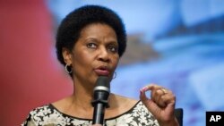 FILE - Phumzile Mlambo-Ngcuka, executive director of U.N. Women, speaks at World Bank headquarters, Washington, May 14, 2014. 