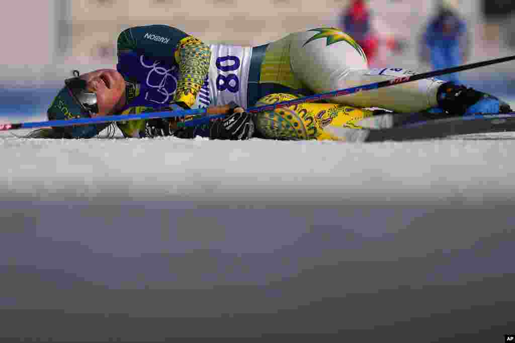 Australia&#39;s Casey Wright reacts after finishing the women&#39;s 10-kilometer classic cross-country skiing competition at the 2022 Winter Olympics, in Zhangjiakou, China.