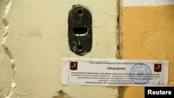 The office door of rights group Amnesty International is sealed off in Moscow, Russia, Nov. 2, 2016.