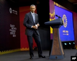 President Obama taking questions in Peru.