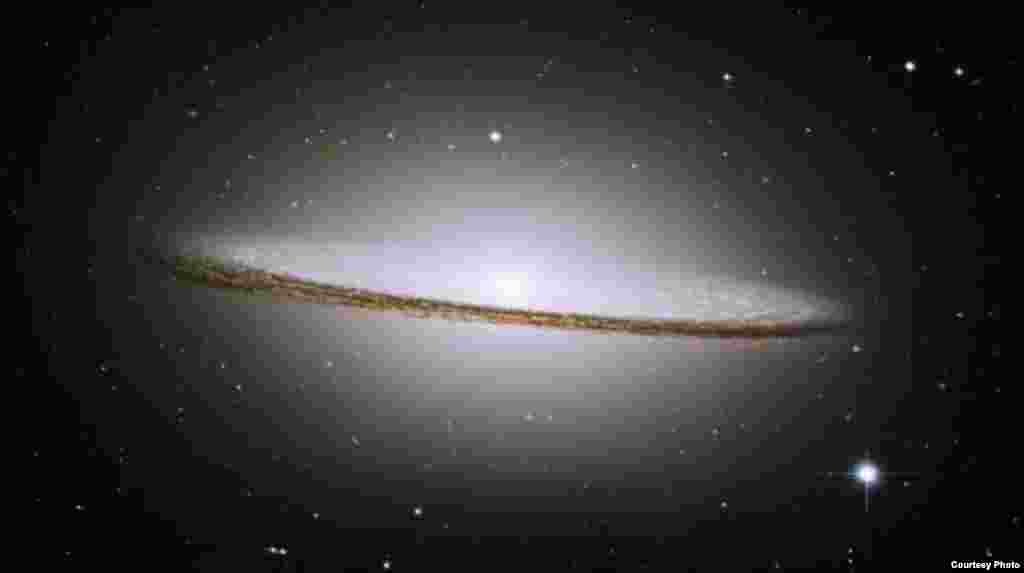 NASA's Hubble Space Telescope has trained its razor-sharp eye on one of the universe's most stately and photogenic galaxies, the Sombrero galaxy. (NASA)