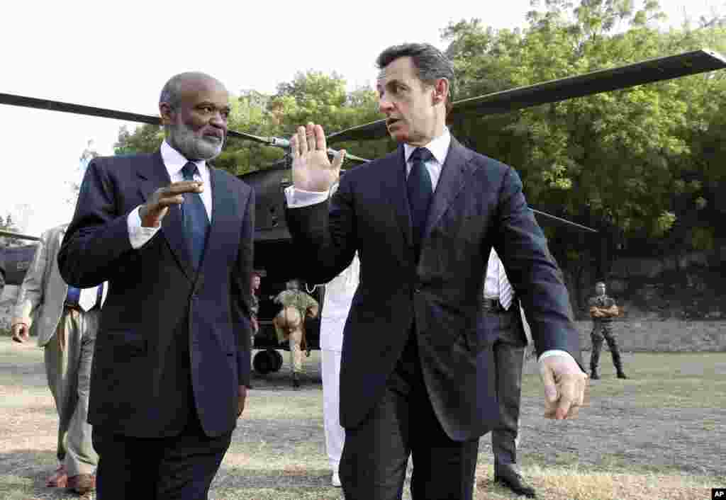 France&#39;s President Nicolas Sarkozy and Haitian President Rene Preval during a visit at French field Hospital in Port au Prince Wednesday, Feb. 17, 2010. Sarkozy is in one day visit in Haiti to evaluate the efforts after Jan. 12 magnitude 7 earthquake. (AP