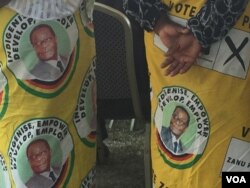 Some of the people in Zvimba communal lands wearing clothes with photos of the late Robert Mugabe.