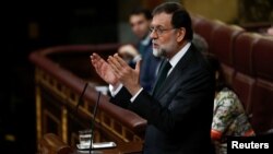 Spain's Prime Minister Mariano Rajoy addresses Parliament on the final day of a motion of no confidence debate in Madrid, June 1, 2018.