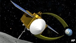 An artist's conception of the OSIRIS-REx spacecraft collecting a sample from asteroid 1999 RQ36 (aka: Bennu)