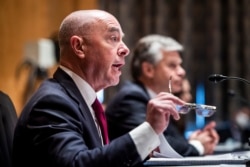 FILE - Secretary of Homeland Security Alejandro Mayorkas testifies before a Senate Homeland Security and Governmental Affairs Committee hearing, Sept. 21, 2021, on Capitol Hill.