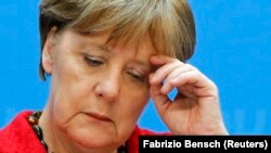 German Chancellor and Christian Democratic Union (CDU) leader Angela Merkel attends a news conference at the CDU party headquarters in Berlin, Germany March 14, 2016. REUTERS/Fabrizio Bensch - RTX29380