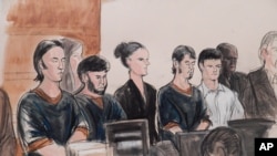 FILE - A courtroom sketch portrays four men accused of plotting to send US residents overseas to fight for the Islamic State: Akhror Saidakhmetov (L), Abror Habibov, (2nd-L), Abdurasul Hasanovich Juraboev (4th-L) and Dilkhayot Kasimov (5th-L), appear in a New York City courtroom, April 8, 2015.