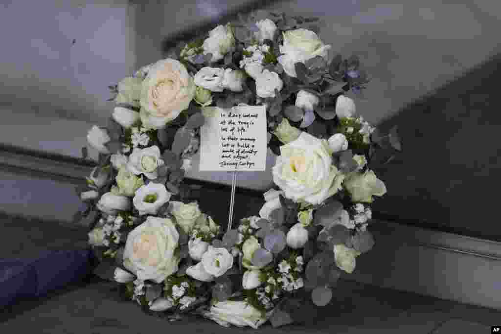 A wreath layed by Britain's leader of the opposition Labour Party Jeremy Corbyn at New Zealand House in London, Friday, March 15, 2019.