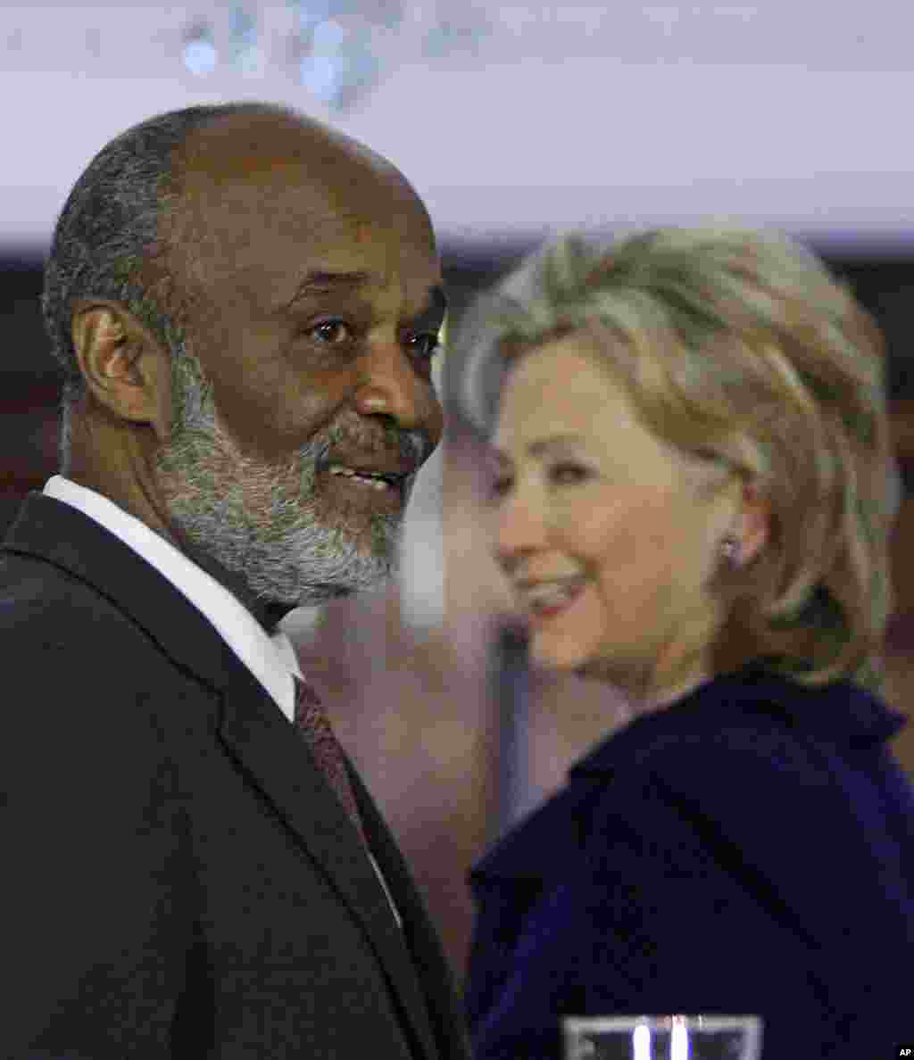 Haitian President Rene Preval, smiles following a joint news conference with Secretary of State Hillary Rodham Clinton, Tuesday, March 9, 2010, at the State Department in Washington. (AP Photo/Haraz N. Ghanbari)