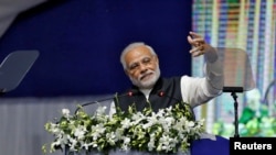 India's Prime Minister Narendra Modi delivers a speech after he inaugurated the country's first international exchange in Gandhinagar, India, Jan. 9, 2017. 