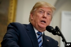 President Donald Trump speaks during an event on cutting federal regulations at the White House, Dec. 14, 2017, in Washington. He called for his Cabinet secretaries, agency heads and federal workers to "cut even more regulations in 2018."