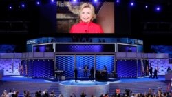 Democratic Presidential candidate Hillary Clinton appears on a large monitor to thank delegates during the second day of the Democratic National Convention in Philadelphia, July 26, 2016. 