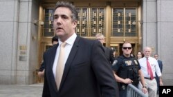 Michael Cohen leaves Federal court in New York, Aug. 21, 2018.