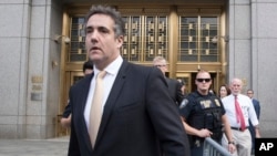 Michael Cohen leaves Federal court in New York, Aug. 21, 2018.