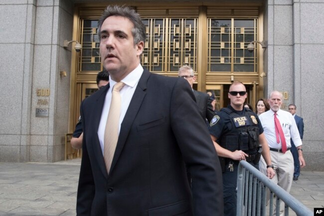 Michael Cohen leaves Federal court in New York, Aug. 21, 2018.