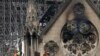 Experts inspect the damaged Notre Dame cathedral after the fire in Paris, April 16, 2019, assessing the blackened shell of Paris' iconic cathedral to establish next steps to save what remains after a devastating fire destroyed much of the almost 900-year-old building. 