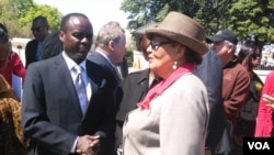 Kenyan Senator Lenny Kivuti chats with a Congresswoman at the Capitol in Washington DC.