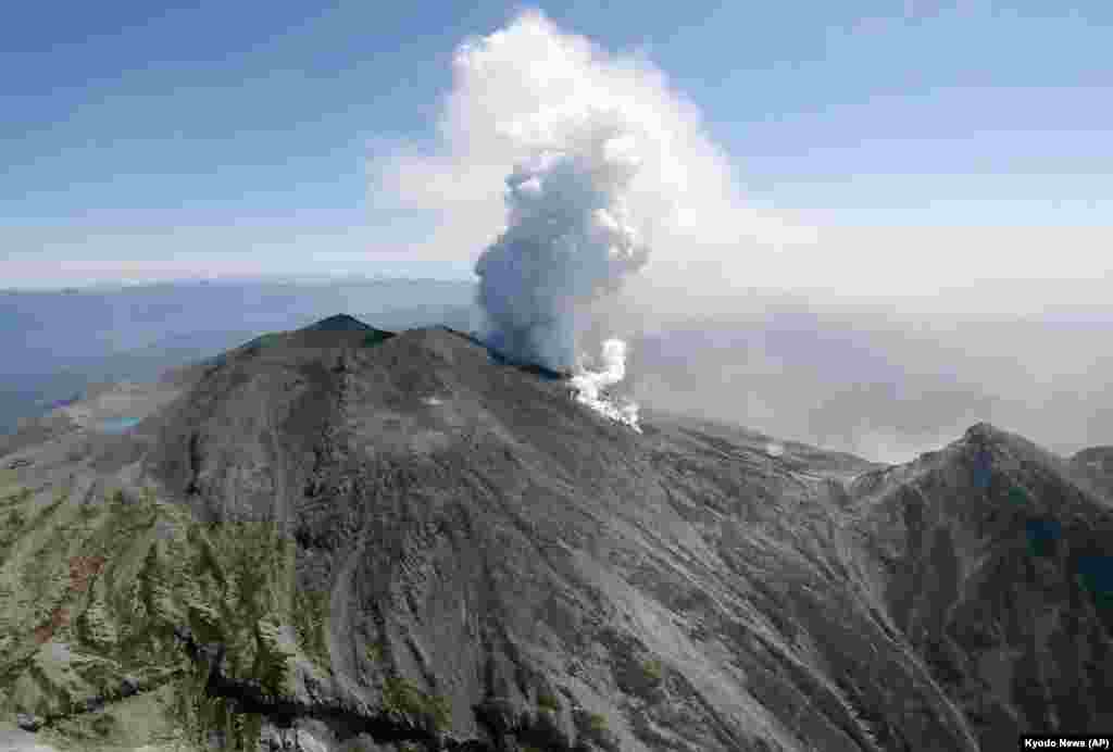 Plumes of smoke and ash billow from Mount Ontake in central Japan, Sept. 28, 2014. 