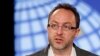 Wikipedia co-founder Jimmy Wales gestures during the opening session at the London Cyberspace Conference, November 1, 2011.