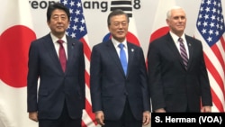 Prime Minister Shinzo Abe of Japan, President Moon Jae-in of South Korea and U.S. Vice President Mike Pence meet in Pyeongchange, South Korea, site of the 2018 Winter Games.