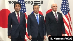 Prime Minister Shinzo Abe of Japan, President Moon Jae-in of South Korea and U.S. Vice President Mike Pence meet in Pyeongchang, South Korea, site of the 2018 Winter Games.