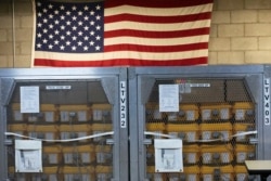 Cages of ventilators, part of a shipment of 400, are displayed, Tuesday, March 24, 2020 at the New York City Emergency Management Warehouse where they will be distributed.