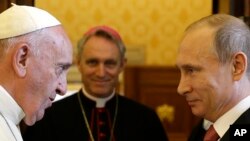 Pope Francis receives Russian President Vladimir Putin at the Vatican, June 10, 2015.