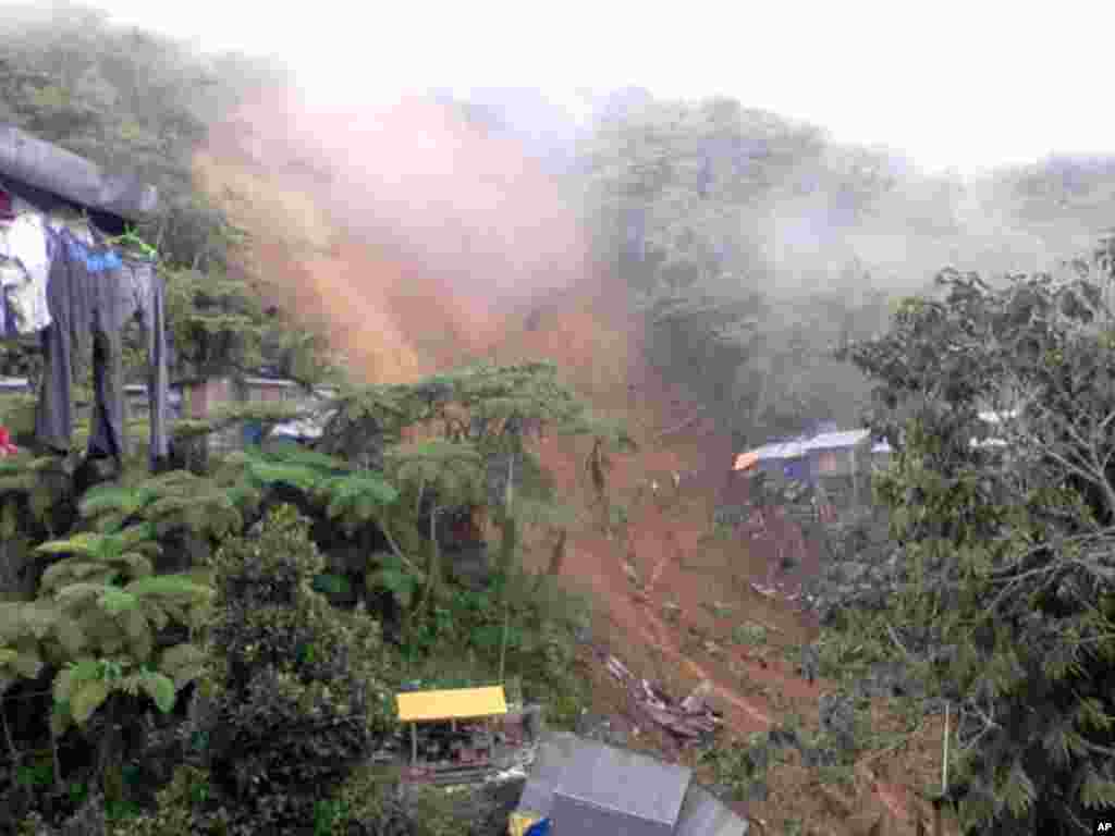 The Bayan Mo Ipatrol Mo (BMPM) provided this photo of the landslide, January 5, 2012. (BMPM/Reuters)