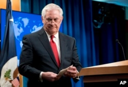 FILE - Secretary of State Rex Tillerson steps away from the podium after speaking at a news conference at the State Department in Washington, March 13, 2018.