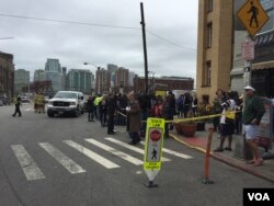 Emergency vehicles, reporters at the scene of the train accident in Hoboken, New Jersey, Sept. 29, 2016. (Photo: Ramon Taylor / VOA)