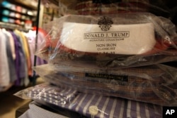 Produk pakaian pria merk Donald Trump di toko Macy's di New York.