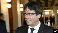 Carles Puigdemont, le leader de l'indépendance catalane, visite le parlement finlandais à Helsinki le 22 mars 2018. 