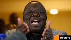 Zimbabwe's Prime Minister Morgan Tsvangirai gestures during a media briefing in Harare Aug. 3, 2013. 