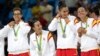 Members of the Spain basketball team celebrate with their silver medals following a women's gold medal basketball game against the United States at the 2016 Summer Olympics in Rio de Janeiro, Brazil, Aug. 20, 2016. 