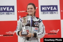 Fabienne Lanz on the winner's podium in Dubai, a few years ago. (Courtesy: Fabienne Lanz's collection)