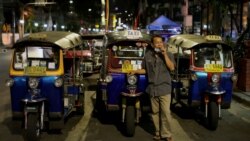 A tuk tuk driver waits for costumers at Khaosan Road as tourism has decreased after coronavirus outbreak in Bangkok, Thailand March 12, 2020. REUTERS/Jorge Silva