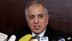 FILE - Zalmay Khalilzad, special adviser on reconciliation, speaks in Kabul, Afghanistan, March 13, 2009. Abdul Ghani Baradar, a co-founder of the Taliban has been appointed head of the group’s political office in Qatar as it negotiates with the U.S. to end the Afghan war.