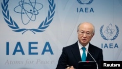 FILE - International Atomic Energy Agency (IAEA) Director General Yukiya Amano addresses a news conference.