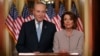 House Speaker Nancy Pelosi, right, and Senate Minority Leader Chuck Schumer pose for photographers after speaking on Capitol Hill in response President Donald Trump's prime-time address on border security, in Washington, Jan. 8, 2019.